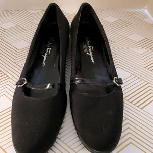 Salvatore Ferragamo black flat shoes . Women size 9